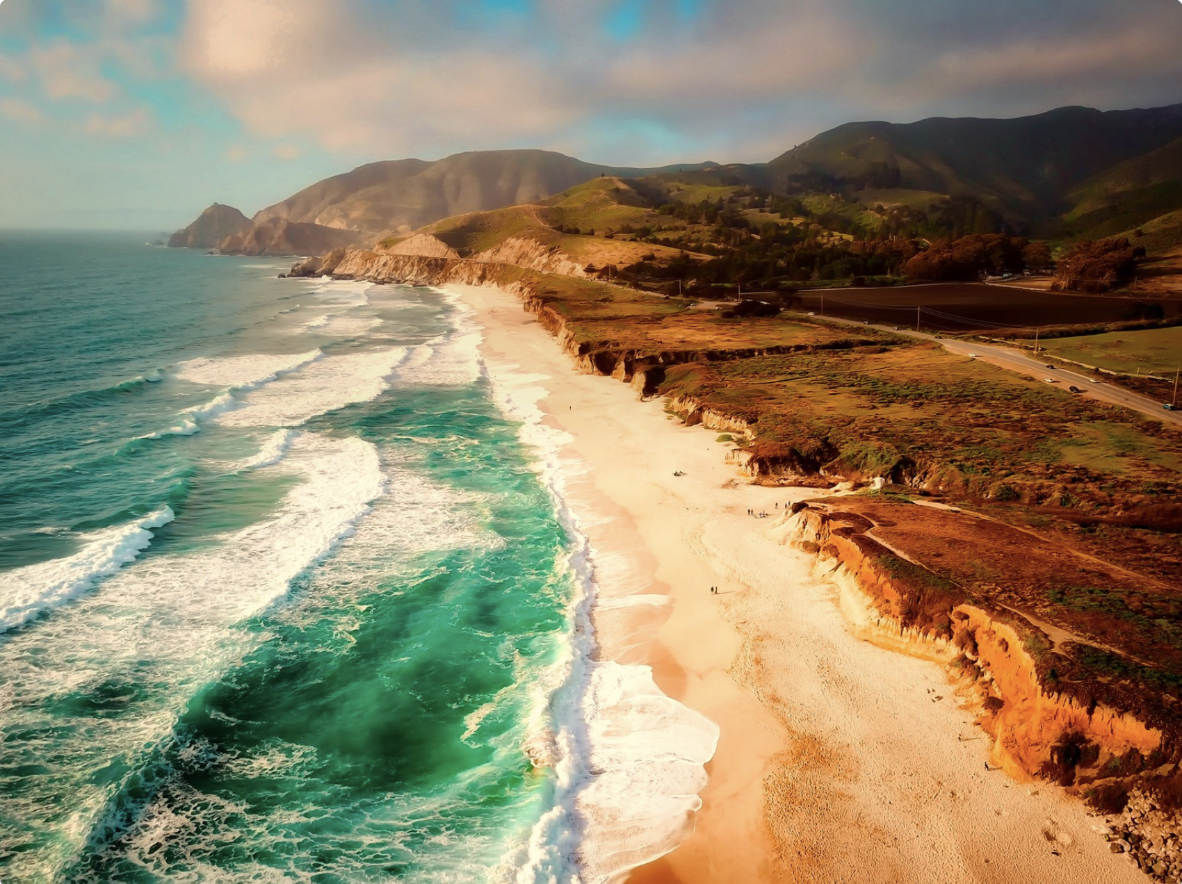 Beach with sand and a blue ocean